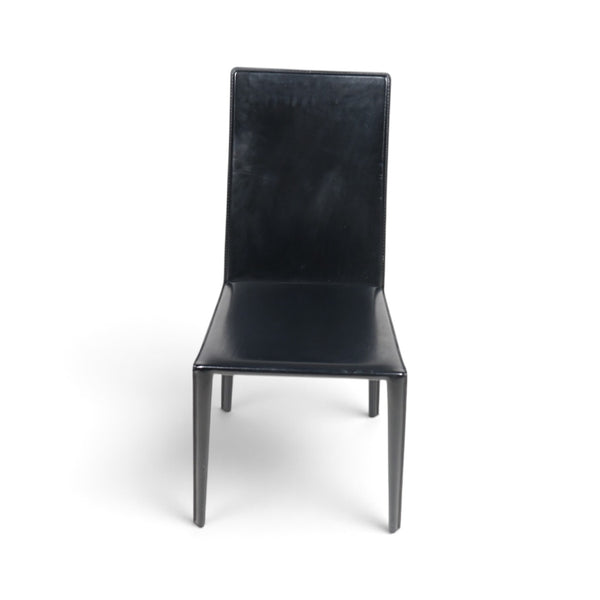 Refurnish by Loopr Arper conference chair in black leather with a high back and slim metal legs.