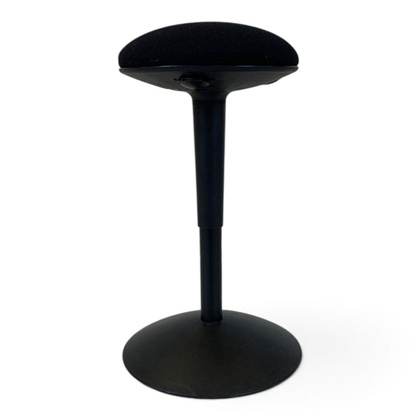 Refurnish by Loopr black ergonomic balance stool designed by Nicholai Wiig-Hansen with a round seat and pedestal base