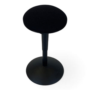 Refurnish by Loopr black Nicholai Wiig-Hansen balance stool with a round upholstered seat and stable base