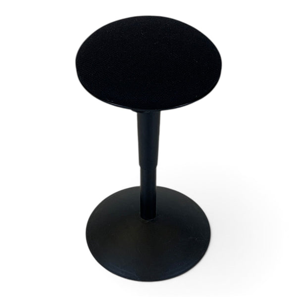 Refurnish by Loopr black Nicholai Wiig-Hansen balance stool with a round upholstered seat and stable base