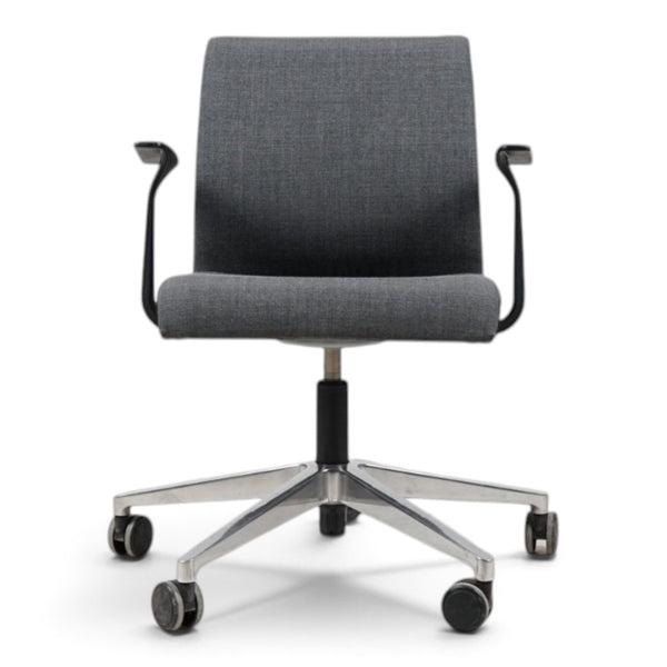 Refurnish by Loopr grey fabric office chair with armrests, adjustable height, and a five-star base with wheels.