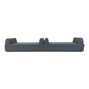 Refurnish by Loopr grey fabric sofa bed in flat sleeping position with two backrest cushions on a white background