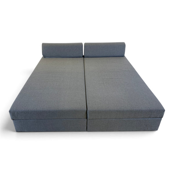 Refurnish by Loopr grey fabric sofa bed in double bed position with a minimalist design on a white background