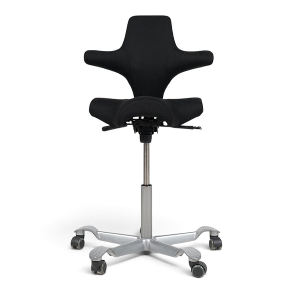 Refurnish by Loopr HÅG Capisco 8106 ergonomic office chair with black saddle seat and silver grey base