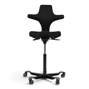 Refurnish by Loopr HÅG Capisco 8107 ergonomic office chair in black fabric with a high-adjustment base.