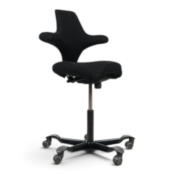 Refurnish by Loopr HÅG Capisco 8106 ergonomic office chair with a black saddle seat and black five-star base.