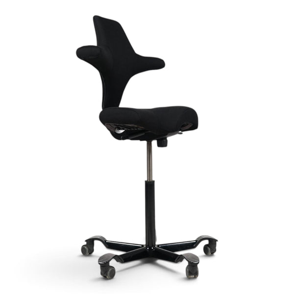 Refurnish by Loopr HÅG Capisco 8107 ergonomic office chair with black saddle seat and tall adjustable base