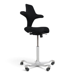 Refurnish by Loopr HÅG Capisco 8106 ergonomic office chair with black saddle seat and grey base on white background