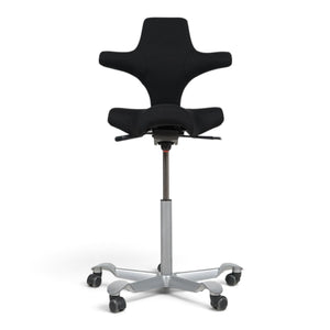 Refurnish by Loopr HÅG Capisco 8106 ergonomic office chair with black saddle seat and silver grey base