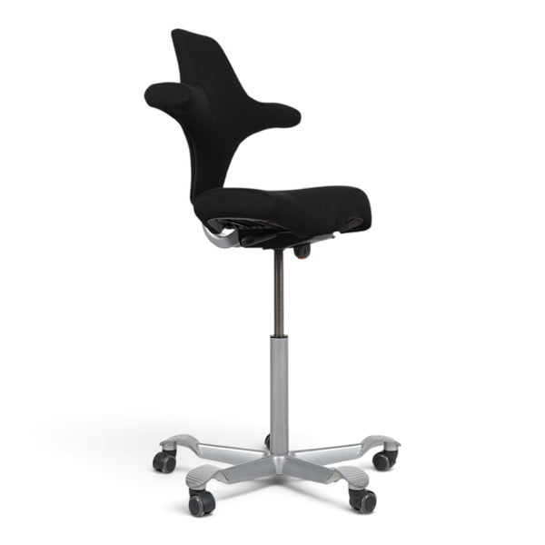 Refurnish by Loopr HÅG Capisco 8106 ergonomic office chair with black saddle seat and silver grey base