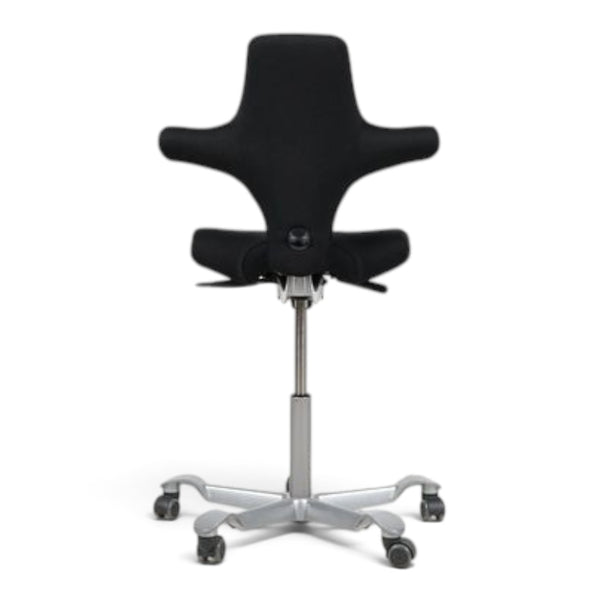 Refurnish by Loopr HÅG Capisco 8106 ergonomic office chair with black saddle seat and silver grey base, rear view.
