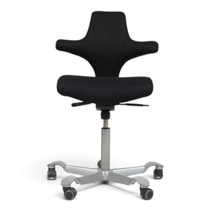 Refurnish by Loopr HÅG Capisco 8106 ergonomic office chair in black fabric with a silver grey five-star base