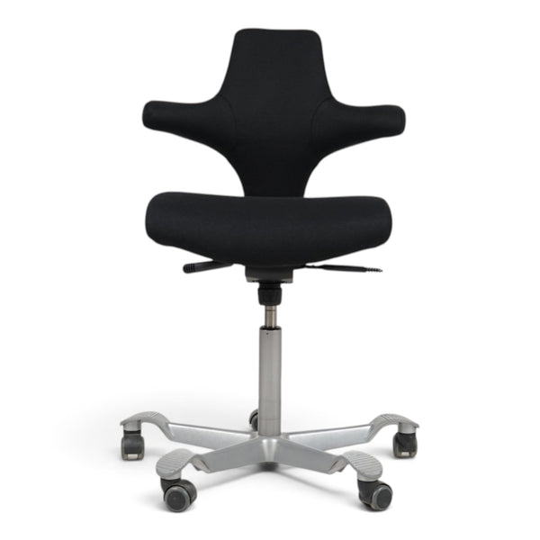 Refurnish by Loopr HÅG Capisco 8106 ergonomic office chair in black fabric with a silver grey five-star base