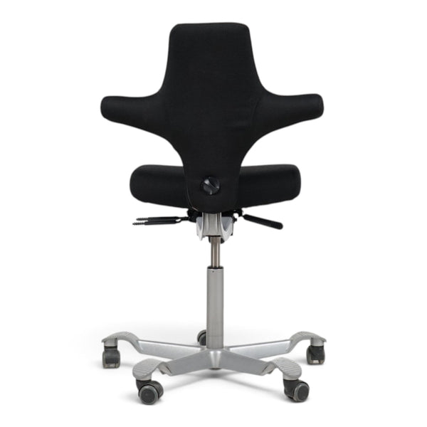Refurnish by Loopr HÅG Capisco 8106 ergonomic office chair in black fabric with a silver grey five-star base