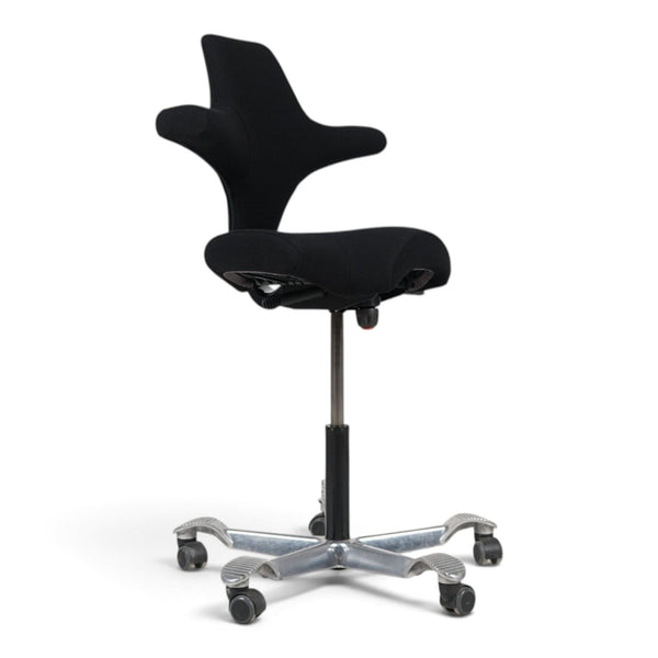 Refurnish by Loopr HÅG Capisco 8106 ergonomic office chair with black upholstered seat and silver metal base