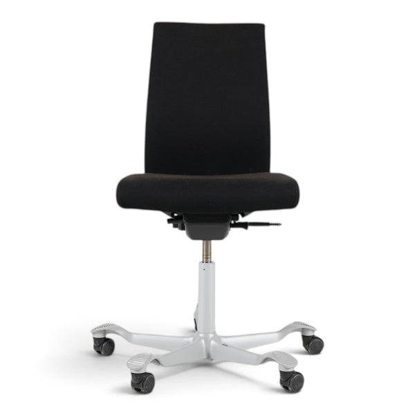 Refurnish by Loopr HÅG Creed 6006 ergonomic office chair in black fabric with a grey five-star base and wheels.