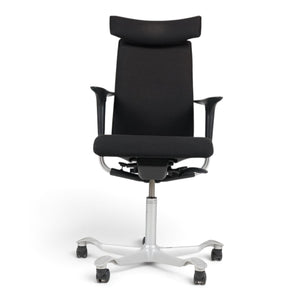Refurnish by Loopr HÅG H05 ergonomic office chair in black fabric with headrest, armrests, and a grey base.
