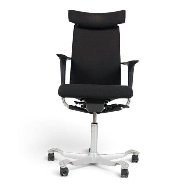 Refurnish by Loopr HÅG H05 ergonomic office chair in black fabric with headrest, armrests, and a grey base.
