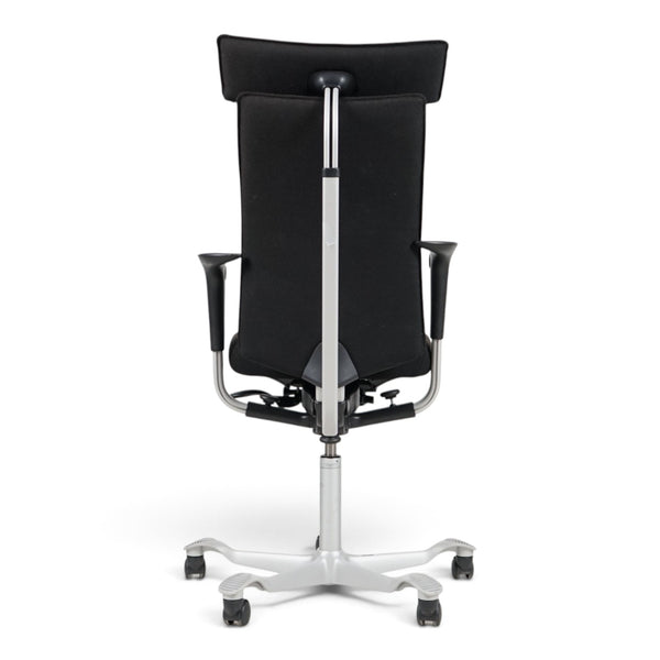 Refurnish by Loopr HÅG H05 5600 ergonomic office chair in black fabric with a grey base, headrest, and armrests.