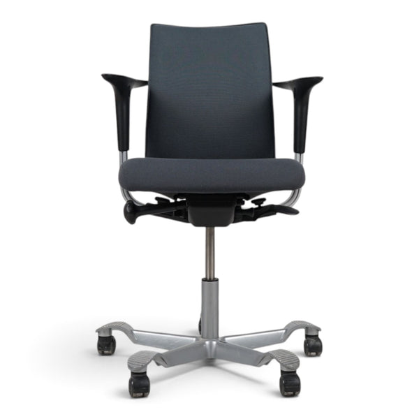 Refurnish by Loopr HÅG H05 5400 office chair with grey fabric seat, black armrests, and silver-grey base