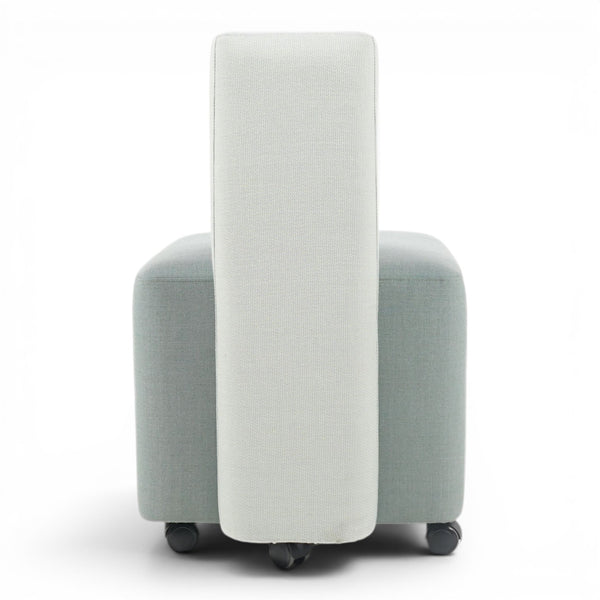 Refurnish by Loopr light blue upholstered puff with half-back and wheels