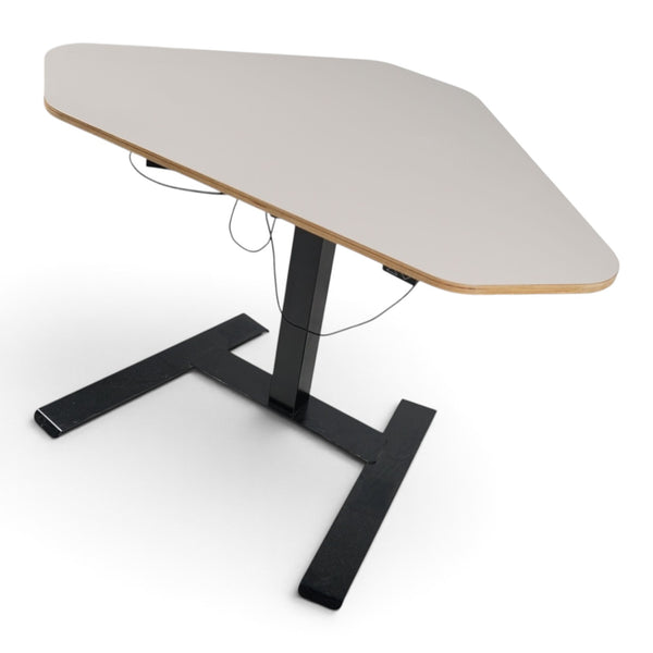 Refurnish by Loopr NOVUS corner sit-stand desk with a clay grey plywood top and black electric height-adjustable base.