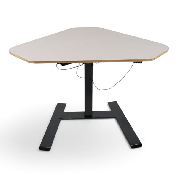 Refurnish by Loopr NOVUS corner sit-stand desk with a clay grey plywood top and a black adjustable metal base.