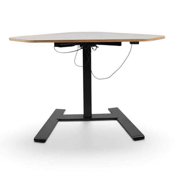 Refurnish by Loopr NOVUS corner sit-stand desk with a clay-grey plywood top and black electric height-adjustable frame.