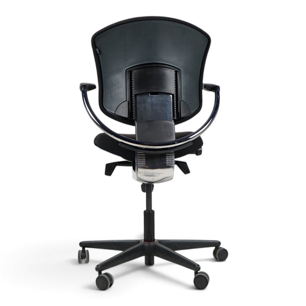 Refurnish by Loopr Savo Ikon ergonomic office chair in black with armrests and a sturdy aluminum base, back view.