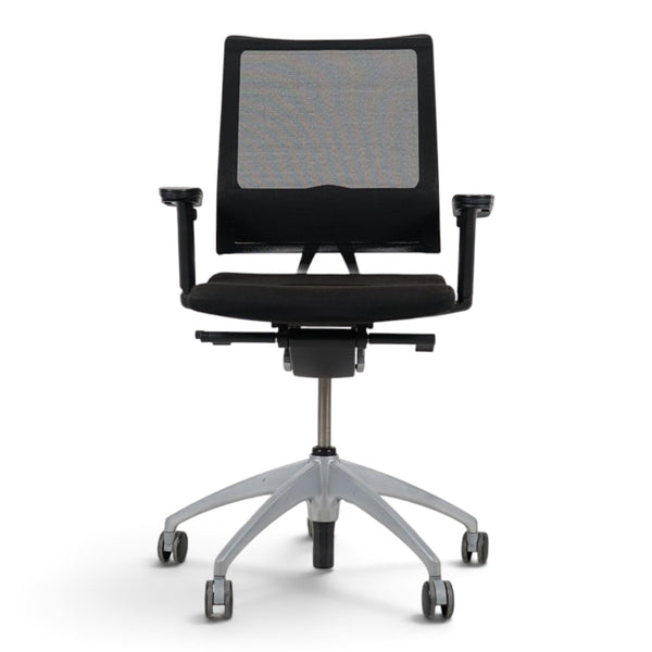 Refurnish by Loopr Sedus ergonomic office chair in black with mesh back, adjustable armrests, and grey base.