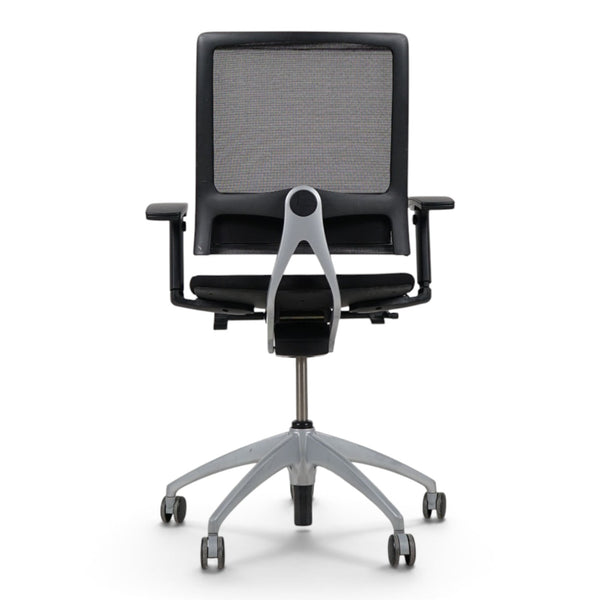Refurnish by Loopr ergonomic Sedus office chair with black mesh back, padded seat, armrests, and grey base.