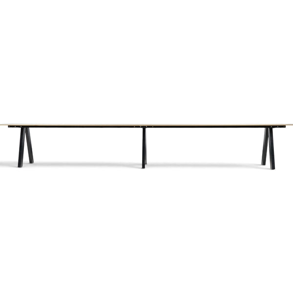 Refurnish by Loopr long conference table by Svenheim with a light wood top and black metal A-frame legs