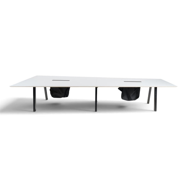 Refurnish by Loopr trapezoid conference table with white top and black metal legs for large office meeting rooms