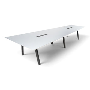 Refurnish by Loopr trapezoid meeting table with a white top and black legs, designed for large office conferences.