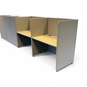 Refurnish by Loopr Vesta Booth workstation with light grey laminate desks and acoustic fabric privacy screens